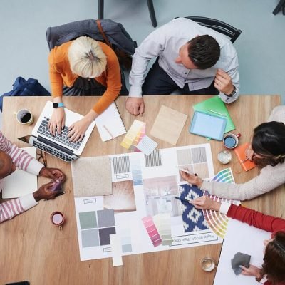 Overhead-Shot-Of-Designers-Planning-Project-In-Office